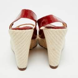 مملوكة مسبقًا صندل كريستيان لوبوتان بلاتفورم بكعب روكي جلد لماع أحمر مقاس 38