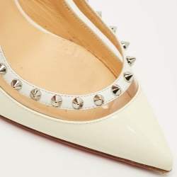 مملوكة مسبقًا حذاء كعب عالي كريستيان لوبوتان بريجاندي سبايك جلد لامع كريمي وبي في سي رباط خلفي مقاس 36.5