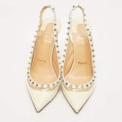 مملوكة مسبقًا حذاء كعب عالي كريستيان لوبوتان بريجاندي سبايك جلد لامع كريمي وبي في سي رباط خلفي مقاس 36.5