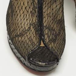 Pre Owned حذاء بوت كريستيان لوبوتان كعب روكى جانيت جلد ثعبان وشبك أسود مقاس 36