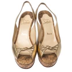 مملوكة مسبقًا صندل كريستيان لوبوتان فتحة كعب كعب روكي جلد ذهبي ميتاليك مقاس 41.5