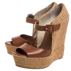مملوكة مسبقًا Christian Louboutin Brown Leather And Jute Praia Wedge Espadrille Platform Ankle Strap Sandals Size 39