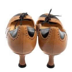 Pre Owned Christian Louboutin Brown/Black Brogue Leather Lady Twist Pumps Size 36