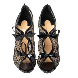 مملوكة مسبقًا حذاء بوت كاحل كريستيان لوبوتان دانتيل إمبيرالتا وجلد لامع أسود مقاس 39 