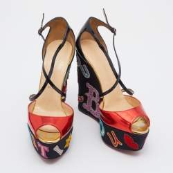 مملوكة مسبقًا صندل كريستيان لوبوتان لوبي زيبا جلد وجلد لامع أسود / أحمر نعل روكي سيو ر متقاطعة  مقاس 37.5