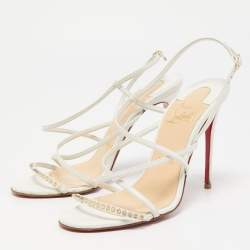 مملوكة مسبقًا صندل كريستيان لوبوتان سبايك جلد أبيض بحزام للكاحل مقاس 36.5