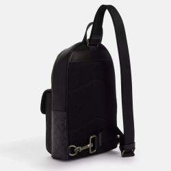 Pre Owned Coach Turnlock Black signature Canvas Sling