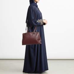 مملوكة مسبقًا حقيبة كوتش كريستي كاريال كبيرة جلد بورجوندي