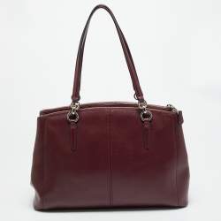 مملوكة مسبقًا حقيبة كوتش كريستي كاريال كبيرة جلد بورجوندي