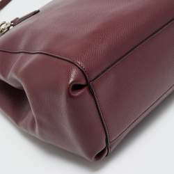 مملوكة مسبقًا حقيبة كوتش كريستي كاريال كبيرة جلد بورجوندي