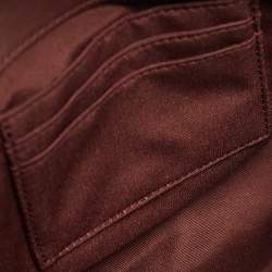 مملوكة مسبقًا حقيبة كروس بدن كوتش جلد سفينو خمري / وردي خوخي