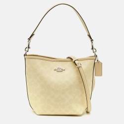 مملوكة مسبقًا Coach City Light Yellow Signature Coated Canvas Bucket Bag