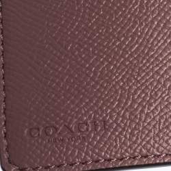 Pre Owned Coach Pink Textured Leather Compact Wallet
