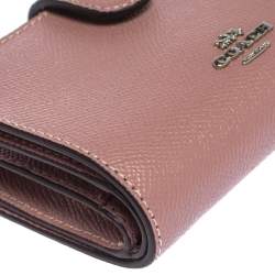 Pre Owned Coach Pink Textured Leather Compact Wallet