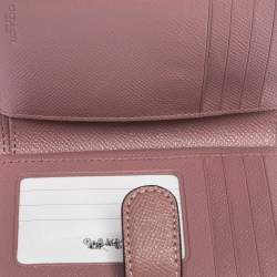 Pre Owned Coach Pink Textured Leather Compact Wallet