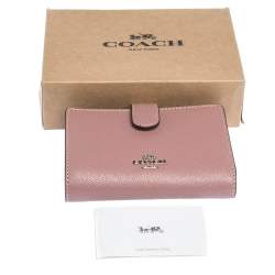 Pre Owned Coach Pink Textured Leather Compact Wallet