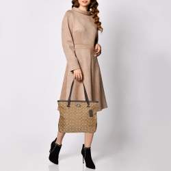 Pre Owned Coach Beige/Brown Signature Canvas and Leather City Zip Top Tote