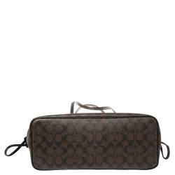 Pre Owned Coach Brown/Black Signature Coated Canvas and Leather Drawstring Carryall Tote
