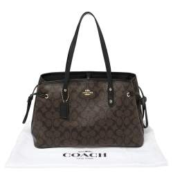 Pre Owned Coach Brown/Black Signature Coated Canvas and Leather Drawstring Carryall Tote