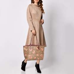 Pre Owned Coach Brown/Beige Floral Print Signature Coated Canvas and Leather Reversible City Tote