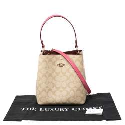 Pre Owned Coach Beige/Pink Signature Coated Canvas and Leather Small Town Bucket Bag