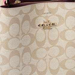 Pre Owned Coach Beige/Pink Signature Coated Canvas and Leather Small Town Bucket Bag
