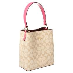 Pre Owned Coach Beige/Pink Signature Coated Canvas and Leather Small Town Bucket Bag