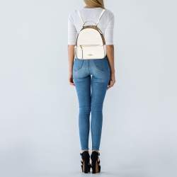 Pre Owned Coach White/Brown Signature Coated Canvas and Leather Jordyn Backpack