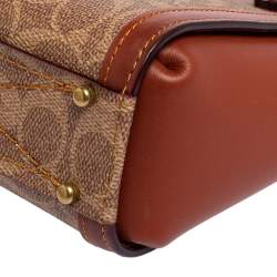 Pre Owned Coach Beige/Brown Signature Coated Canvas and Leather Troupe 16 Tote
