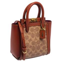 Pre Owned Coach Beige/Brown Signature Coated Canvas and Leather Troupe 16 Tote