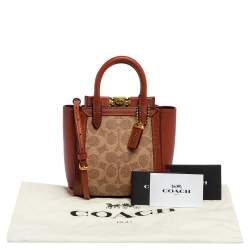 Pre Owned Coach Beige/Brown Signature Coated Canvas and Leather Troupe 16 Tote