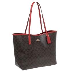 Pre Owned Coach Brown Signature Canvas And Leather City Tote