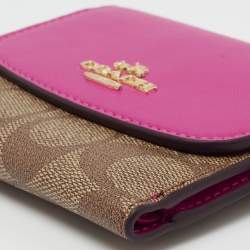 Pre Owned Coach Pink/brown Signature Coated Canvas and Leather Flap Compact Wallet