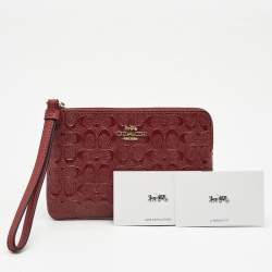 Pre Owned Coach Red Signature Debossed Patent Leather Zip Wristlet Pouch