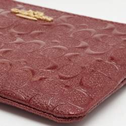 Pre Owned Coach Red Signature Debossed Patent Leather Zip Wristlet Pouch