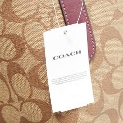Pre Owned Coach Beige/Purple Signature Coated Canvas and Leather City Tote