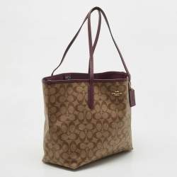 Pre Owned Coach Beige/Purple Signature Coated Canvas and Leather City Tote