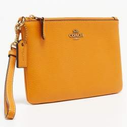 Pre Owned Coach Orange Leather Wristlet Zip Pouch
