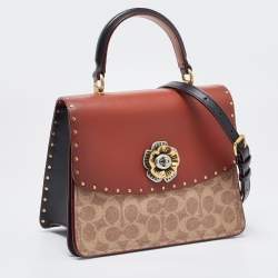 Pre Owned Coach Beige/Brown Signature Coated Canvas and Leather Parker Top Handle Bag