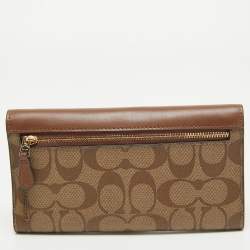 Pre Owned Coach Brown/Beige Signature Coated Canvas and Leather Trifold Long Wallet