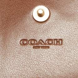 Pre Owned Coach Brown/Beige Signature Coated Canvas and Leather Trifold Long Wallet