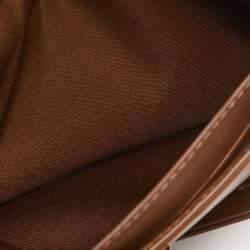 Pre Owned Coach Brown/Beige Signature Coated Canvas and Leather Trifold Long Wallet