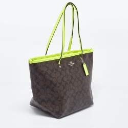 Pre Owned Coach Green/Brown Signature Coated Canvas and Leather Street Zip Tote