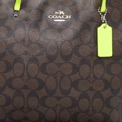 Pre Owned Coach Green/Brown Signature Coated Canvas and Leather Street Zip Tote