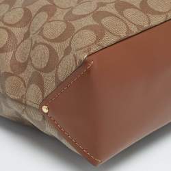 Pre Owned Coach Brown/Beige Signature Coated Canvas Abby Duffle Shoulder Bag