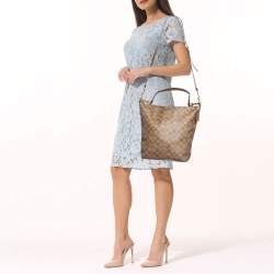 Pre Owned Coach Brown/Beige Signature Coated Canvas Abby Duffle Shoulder Bag