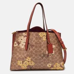 Coach Brown Prairie Floral Signature Coated Canvas and Leather Charlie Carryall Tote
