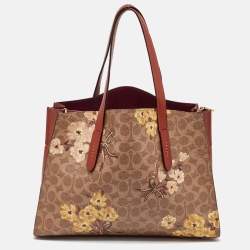 Coach Brown Prairie Floral Signature Coated Canvas and Leather Charlie Carryall Tote