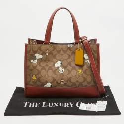 Coach x Peanuts Khaki/Woody Red Snoopy Woodstock Print Coated Canvas Dempsey Carryall Bag