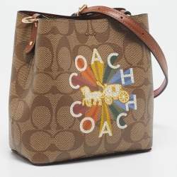 Pre Owned Coach Beige Signature Coated Canvas and Leather Mini Radial Rainbow Town Bucket Bag